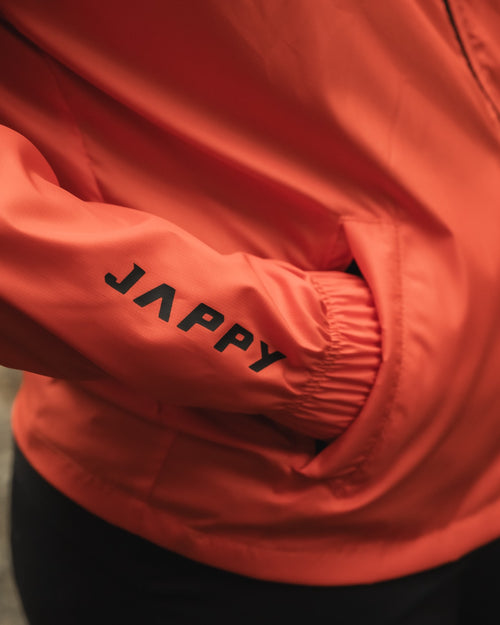 Cortavientos Naranja - Mujer